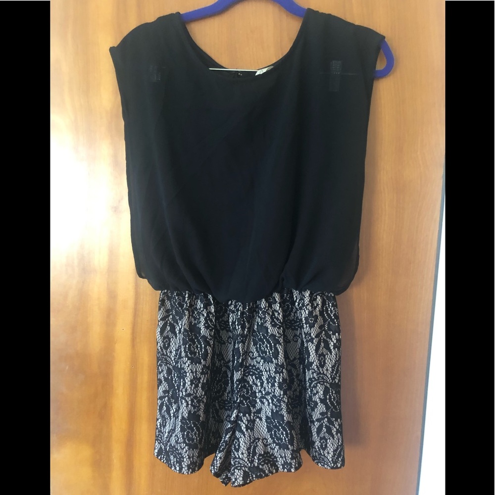 Black lace romper with open back size L